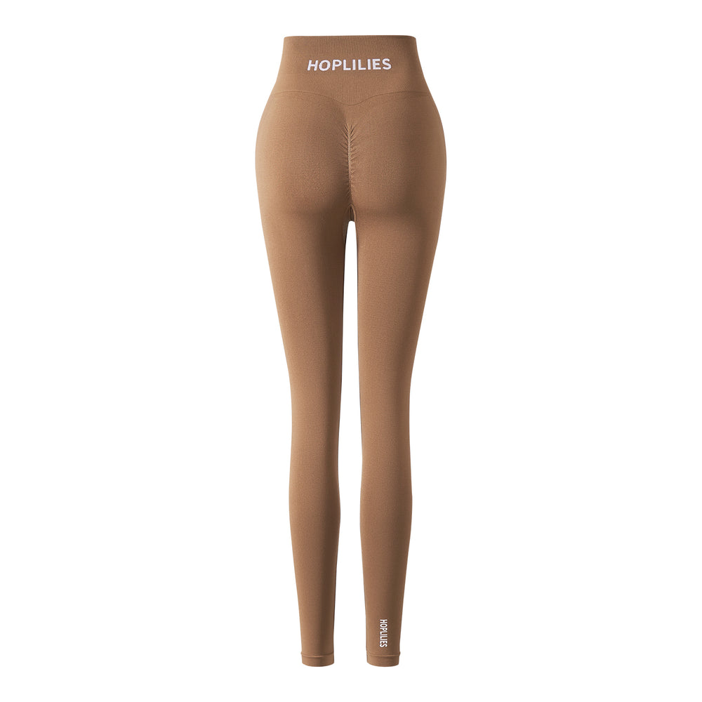 
                      
                        CRUNCH SEAMLESS LEGGING - Malt Ball
                      
                    